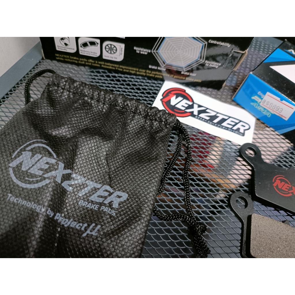 39.ผ้าเบรคหลัง NEXZTER  106107AA ใส่รถรุ่น KAWASAKI KTX 125,150,250 / ​KLX 300R,250 / D-TRACKER