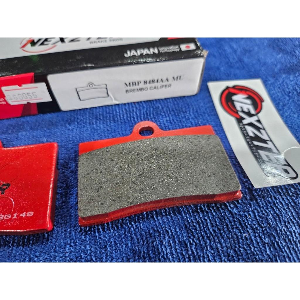 29. ผ้าเบรคหน้า NEXZTER 8484AA ผ้าเบรคปั๊ม BREMBO CALIPER 4 POT หูชิด