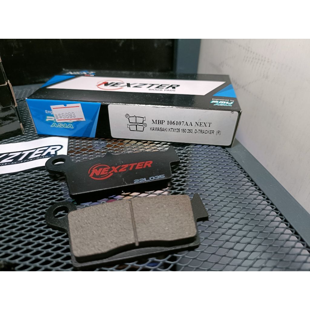 ผ้าเบรคหลัง NEXZTER  106107AA ใส่รถรุ่น KAWASAKI KTX 125,150,250 / ​KLX 300R,250 / D-TRACKER.39